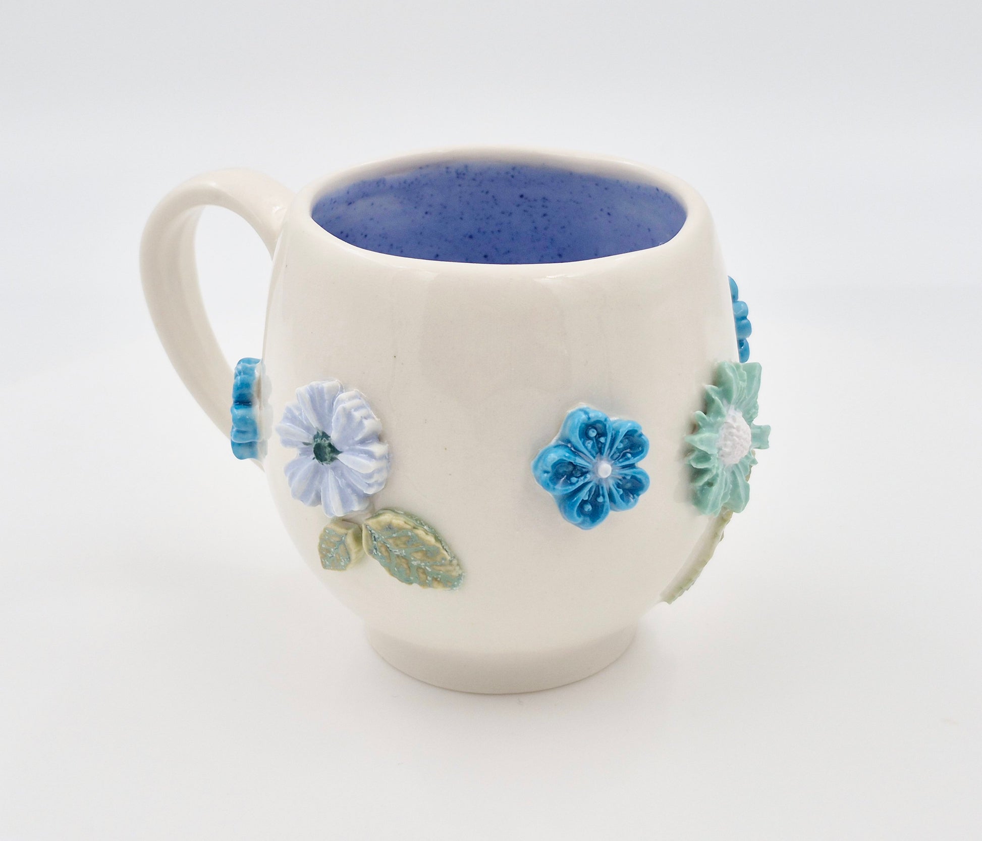 Blomsterkrus i porcelænsler (højde 9 cm, 2,5 dl)