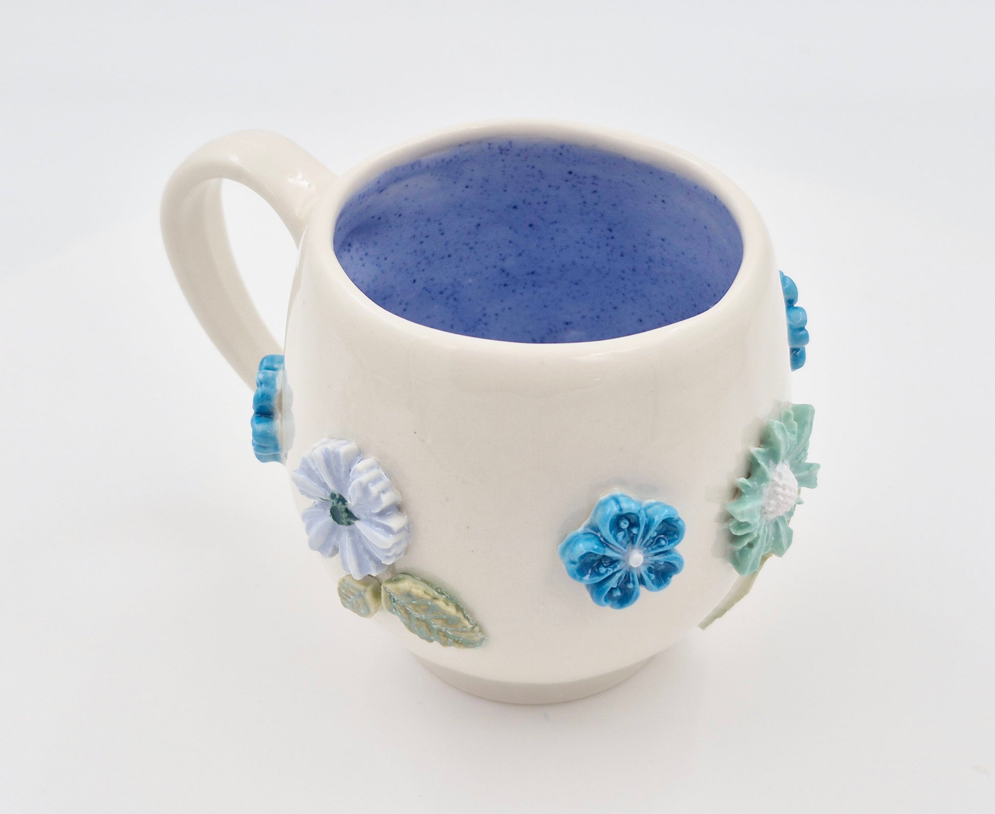 Blomsterkrus i porcelænsler (højde 9 cm, 2,5 dl)