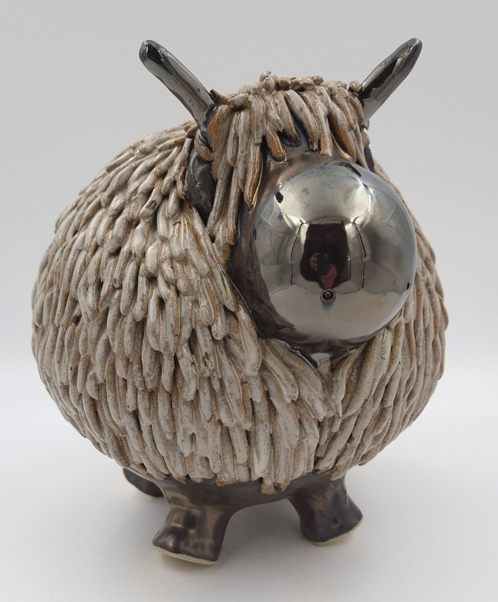 Stor højlandsko brunmeleret - 24 cm