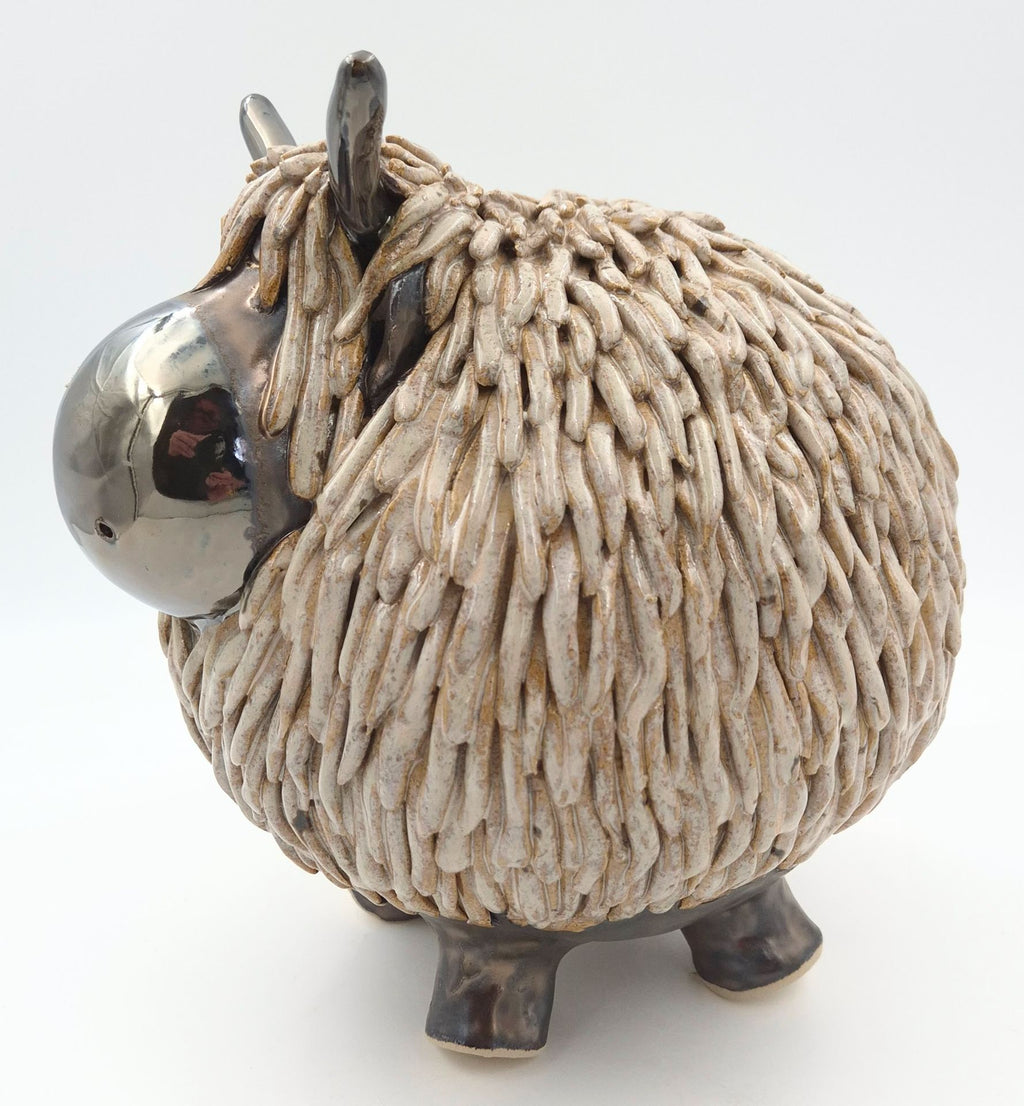 Stor højlandsko brunmeleret - 24 cm