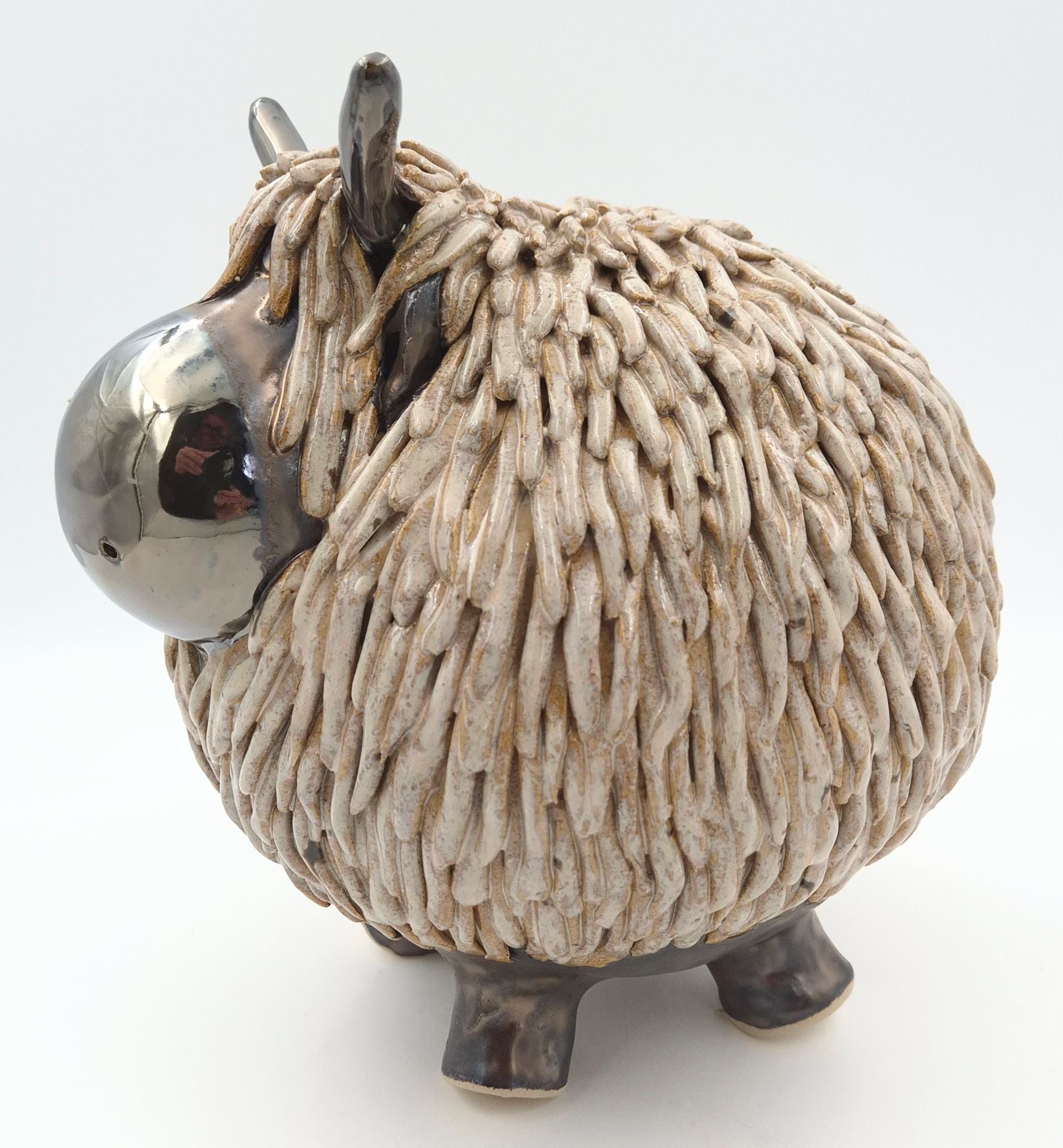 Stor højlandsko brunmeleret - 24 cm