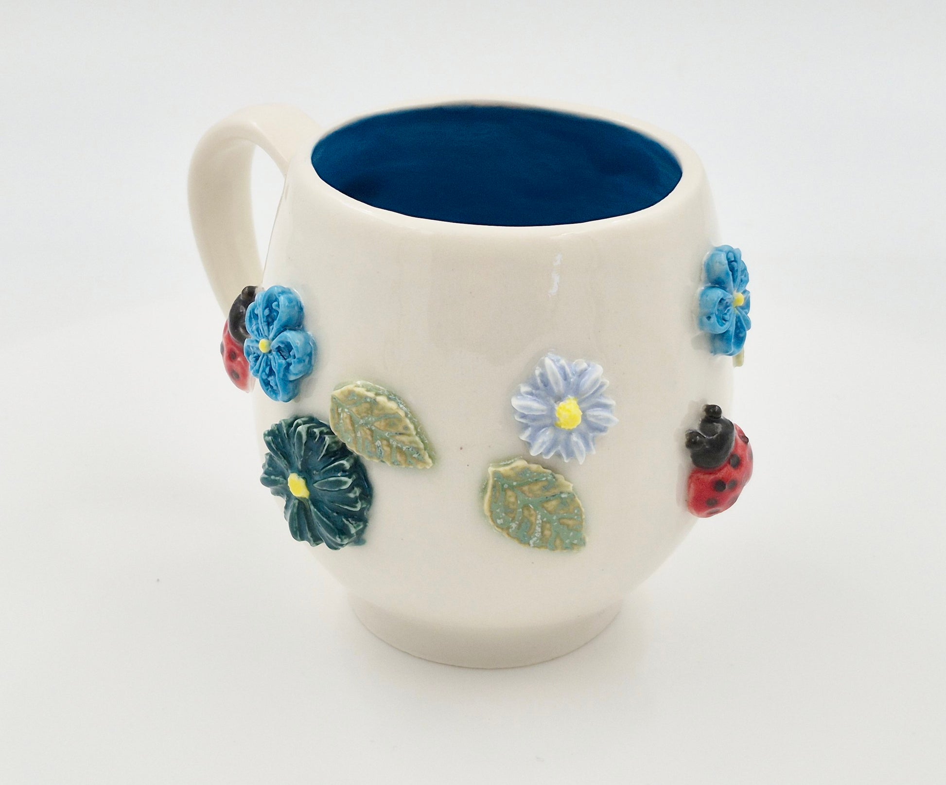 Blomsterkrus i porcelænsler (højde 9 cm, 2,5 dl)