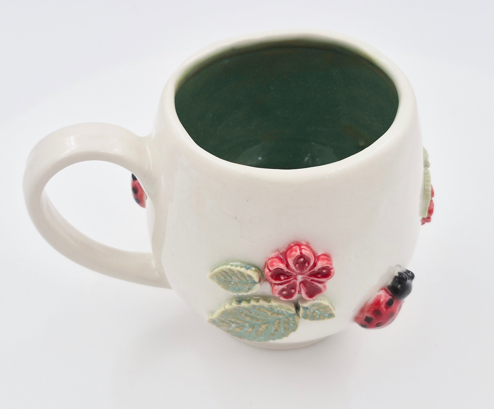 Blomsterkrus i porcelænsler (højde 9 cm, 2,5 dl)