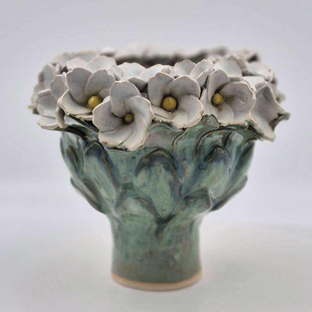 Lille vase med blomsterkrans