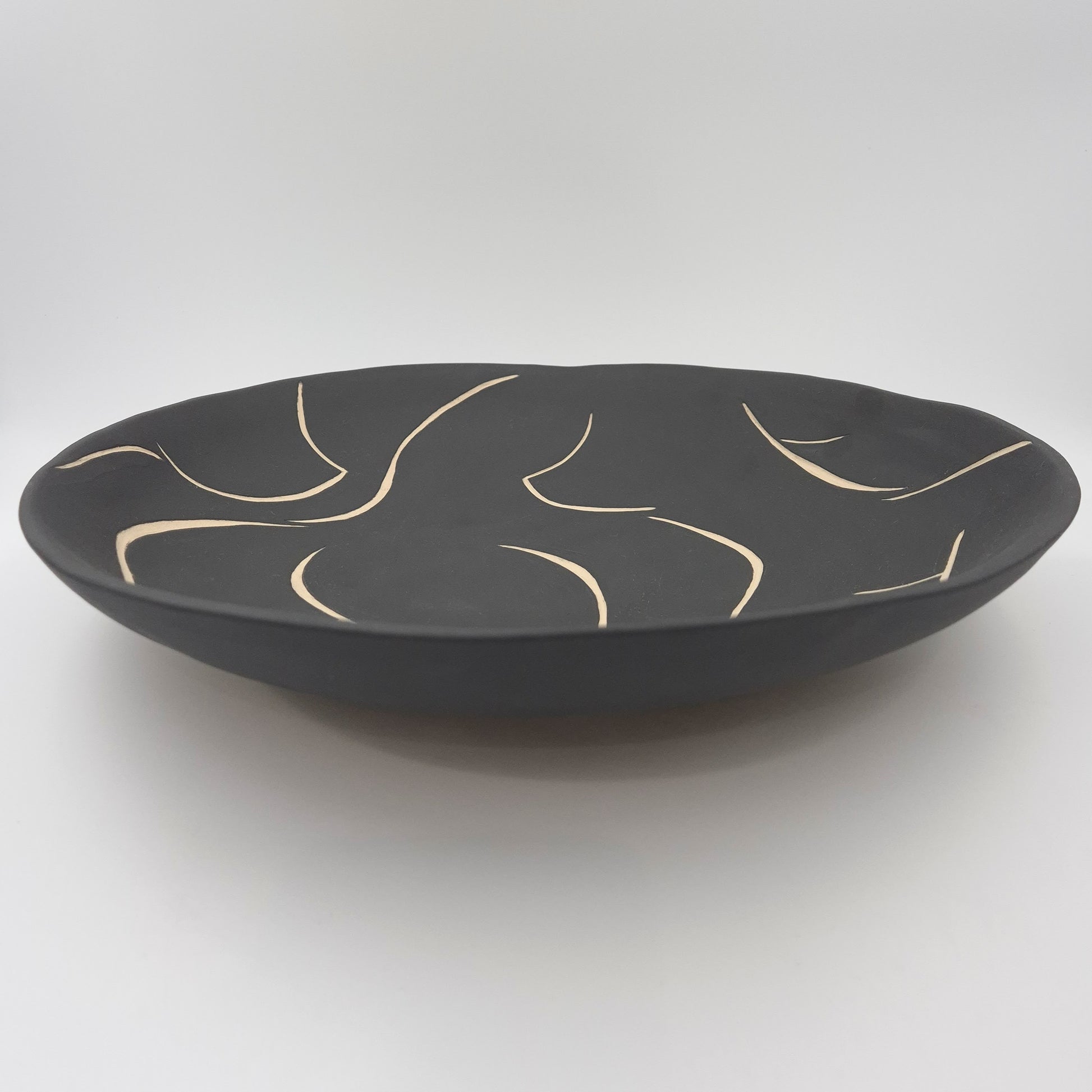 Fad med kvindekroppe – mat sort